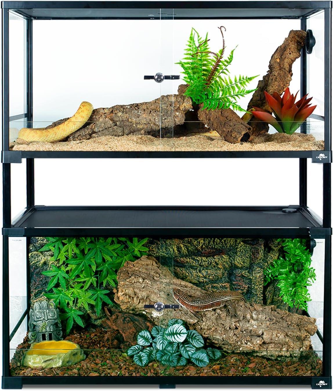 Stacked reptile terrariums with natural habitat decor, logs, plants, and reptile hideout Main image