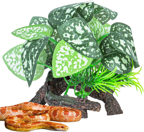 Artificial reptile terrarium plant decoration with a small orange snake resting beneath