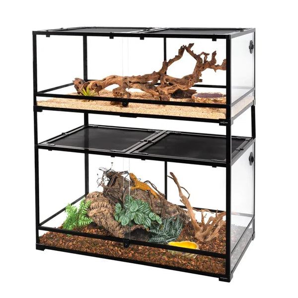 Stacked glass reptile terrariums with driftwood, plants, and natural substrate