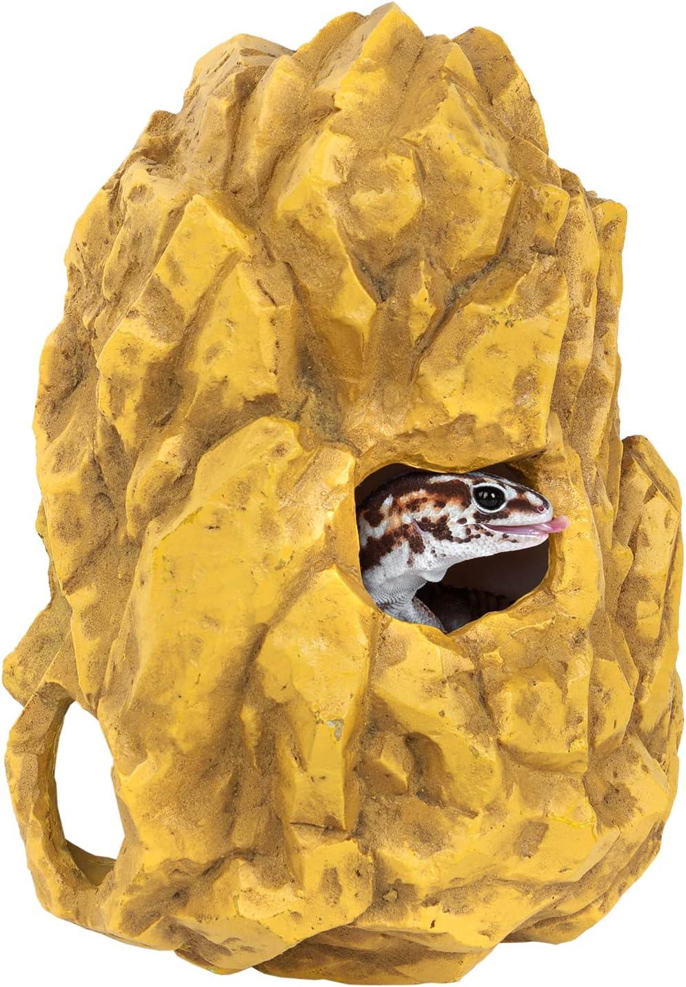 Leopard gecko peeking out of yellow reptile hide rock decor for terrarium habitat Main image