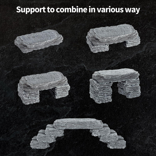 Stackable reptile terrarium rock hides in five different combinations on black background.
