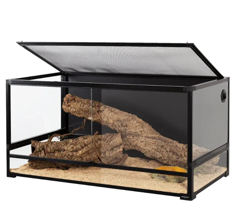 Glass reptile terrarium with mesh lid, cork log branches, and sand substrate Main image