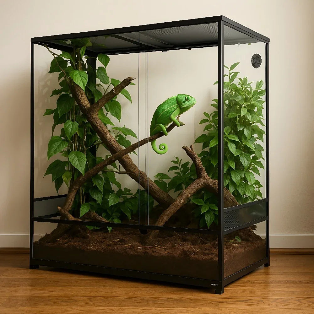 Large glass reptile terrarium with plants, branches, and a green chameleon inside Main image