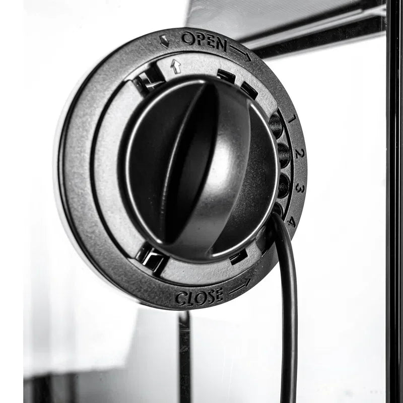 Close-up of adjustable ventilation knob with cable on a glass reptile terrarium enclosure