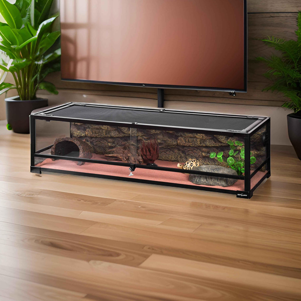 50 gallon glass reptile terrarium with sliding doors and natural decor on hardwood floor