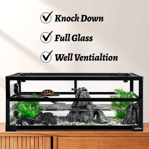 Full glass reptile terrarium with ventilation, rocks, plants, and a turtle inside.
