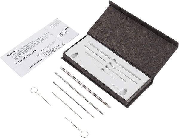 Reptile shedding aid kit with five metal rods, instruction card, and storage box for terrarium maintenance