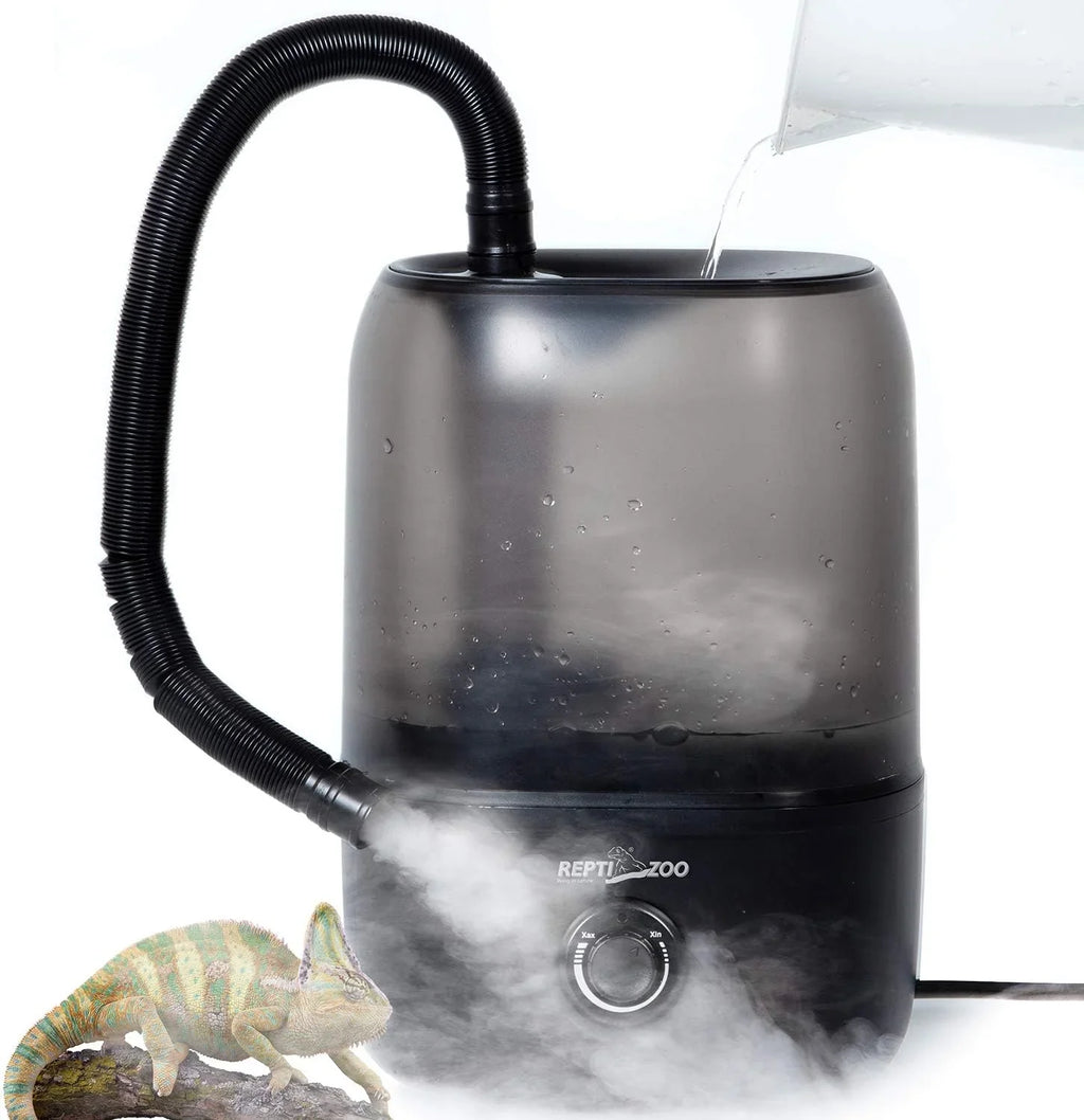 Reptile humidifier with hose emitting mist, water being poured in, and a chameleon nearby