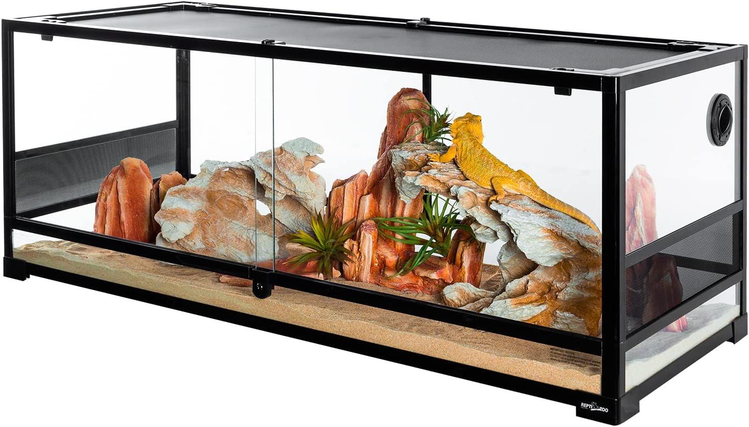 Glass reptile terrarium with mesh top, realistic rock decor, and bearded dragon inside