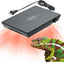 Reptile tank heat lamp with power cord emitting red light over a colorful chameleon