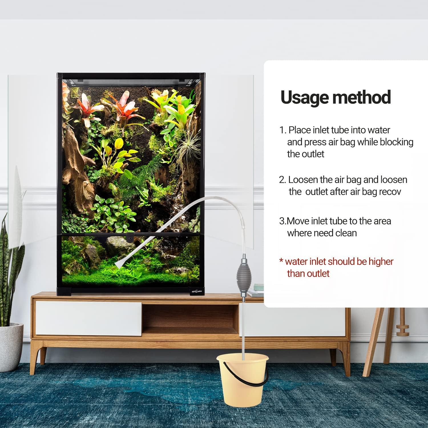 Vertical reptile terrarium with lush plants, siphon cleaning tube connected to bucket, usage instructions shown