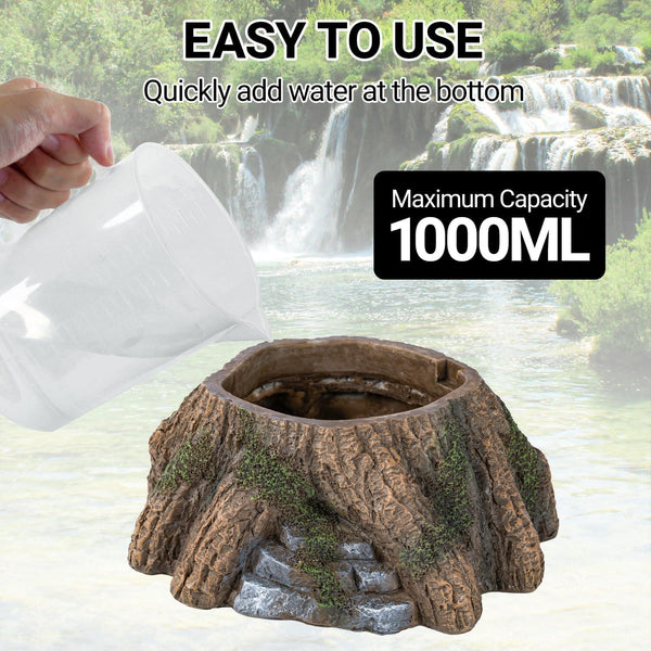 Hand pouring water into tree stump reptile water dish, 1000ml capacity, terrarium accessory.