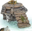 Turtle basking platform with waterfall, turtles climbing on textured rock ramp in water.