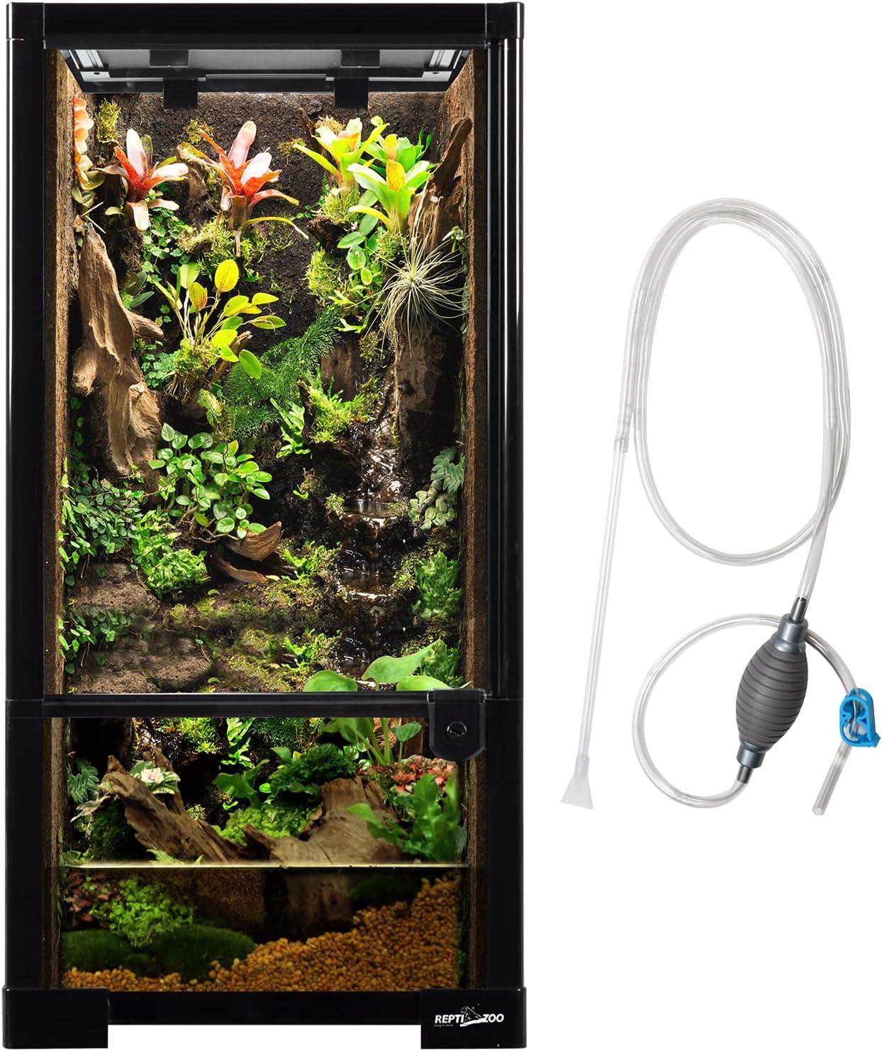 Glass reptile terrarium with lush plants and cleaning siphon tube, vertical vivarium setup Main image