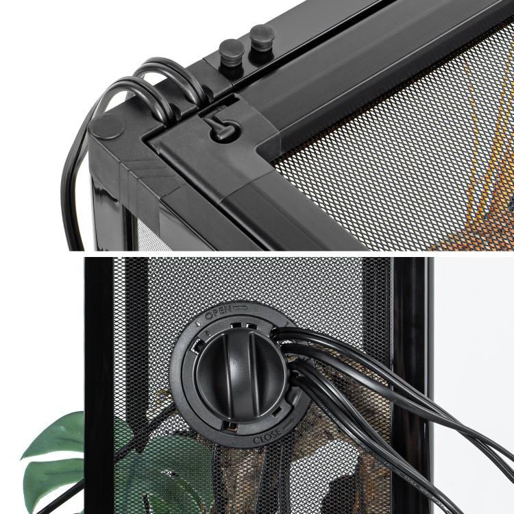 Close-up of reptile terrarium mesh screen top and cable grommet with multiple cords