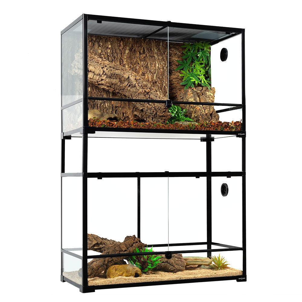 Stacked glass reptile terrariums with natural backgrounds, plants, and climbing logs Main image