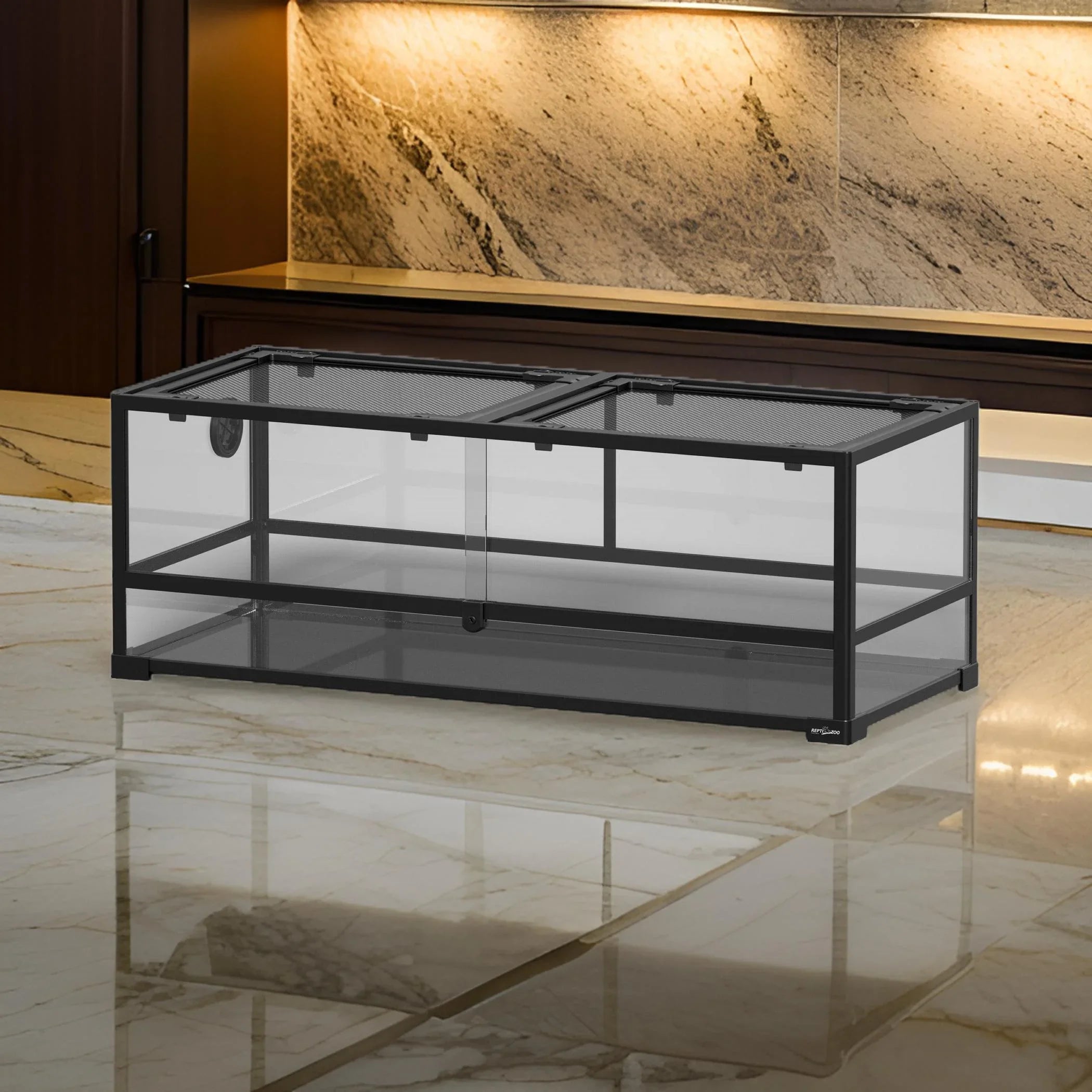 Large glass reptile terrarium with metal frame and mesh top on marble floor Main image